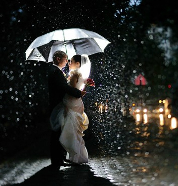 First-hug-afted-getting-married-in-rain-600x375